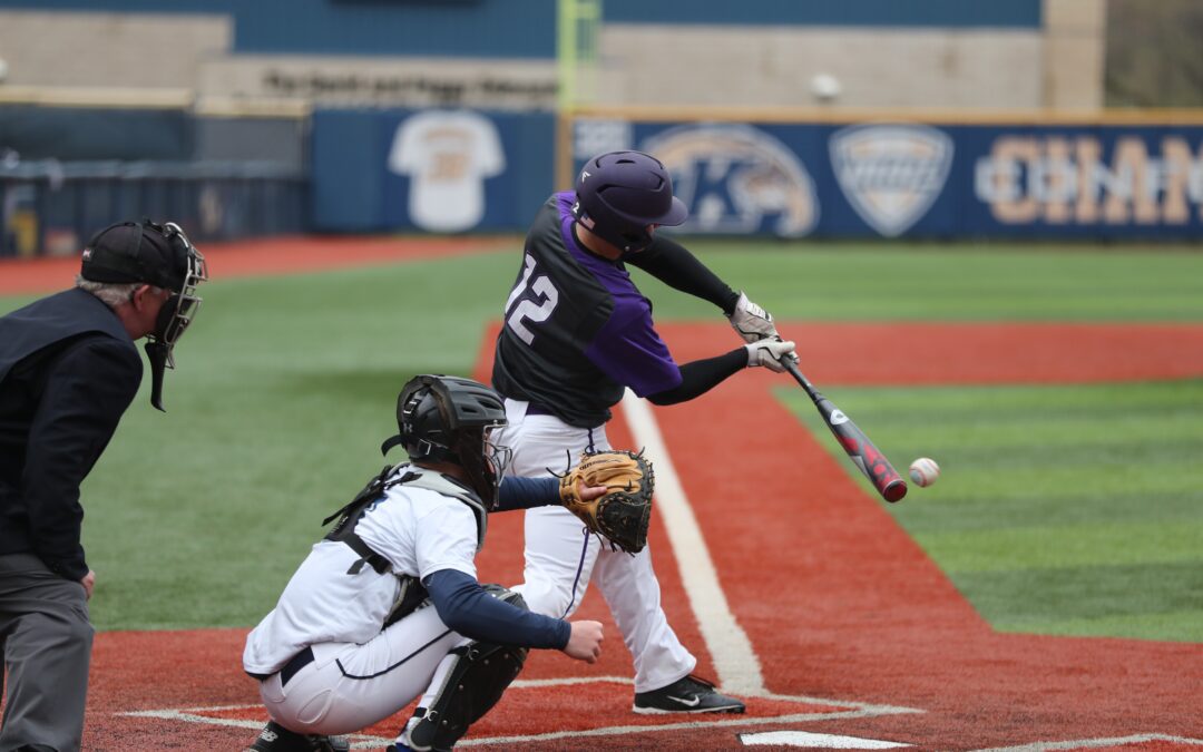 The batter swings the bat to hit the ball and baseball pitcher is behind batter