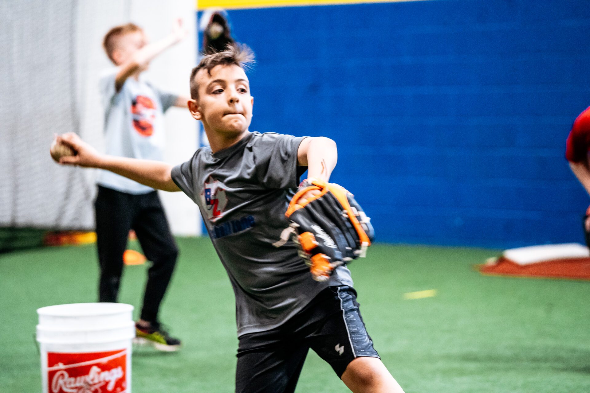 The-Baseball-Zone-kid-holding-baseball-bat